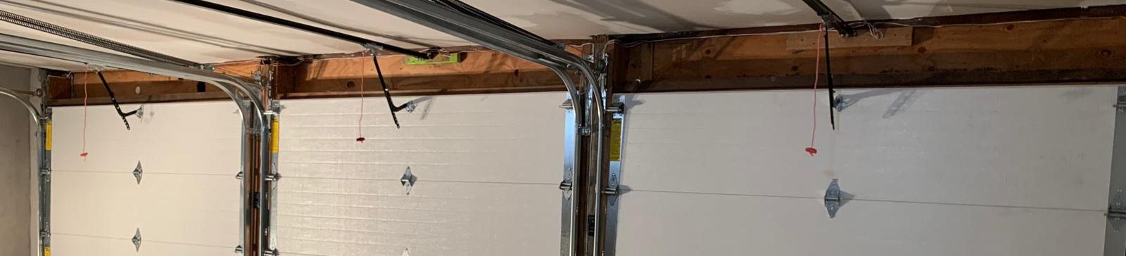 New Overhead Door System, Lakewood Freshly installed triple automatic garage door system, inside view