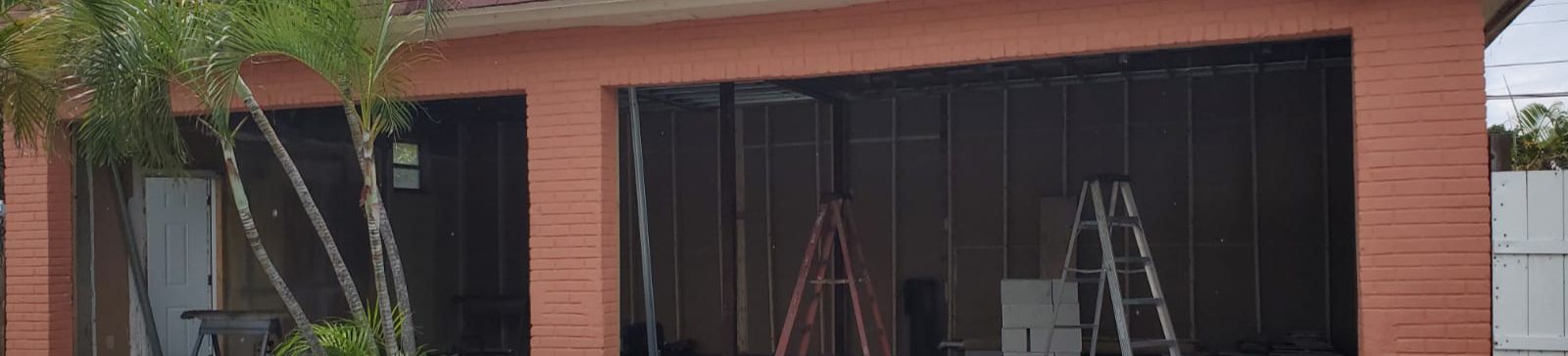 Outside view of unfinished garage opening during a Seattle garage door installation