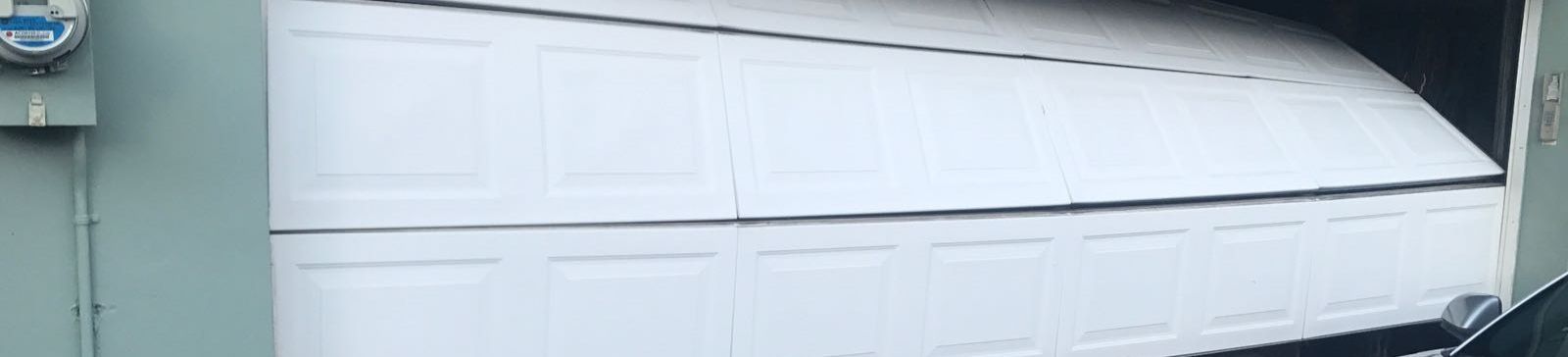 Off Track Garage Door Repair Steilacoom Garage door off track in Steilacoom WA before repairs