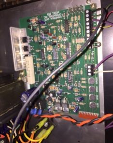 Close-up of circuit board repair in a North Puyallup opener