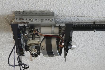 Rewiring and mechanical repair of garage door opener unit