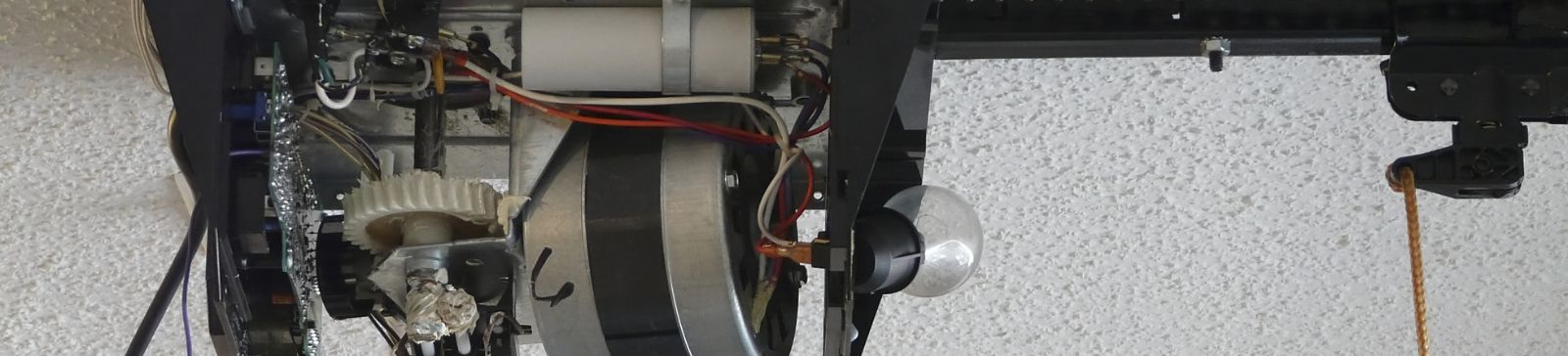 Rewiring and mechanical repair of garage door opener unit