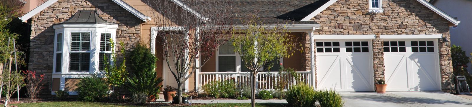 Front view of a Sumner, WA home featuring quality residential garage doors