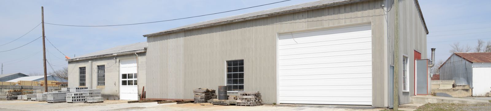 Exterior view of a commercial garage door repair facility in Mountlake Terrace